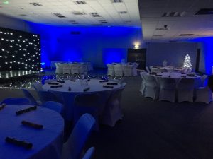 masefield suite wedding set up with blue lighting