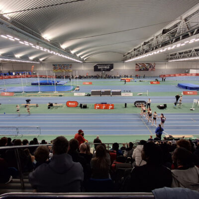 Indoor athletics track. A view from the spectators stand.